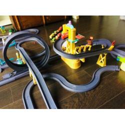Chuggington baan en heel veel treintjes, met koffer en DVD's