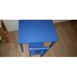 Kindertafel en stoel. Ziet er nog goed uit