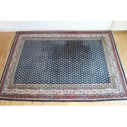 Handgeknoopt blauw Perzisch tapijt. Oosters vintage kleed