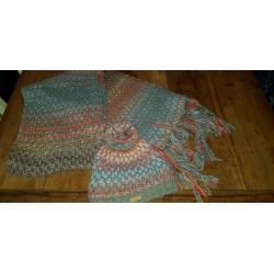 Nieuwe muts en shawl barts
