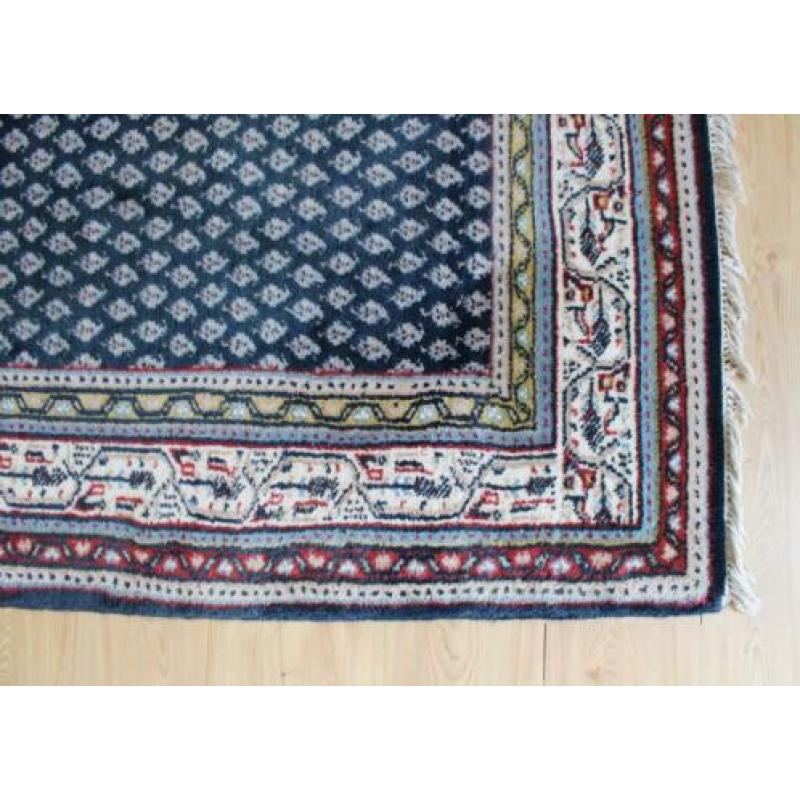 Handgeknoopt blauw Perzisch tapijt. Oosters vintage kleed