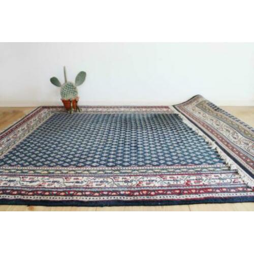 Handgeknoopt blauw Perzisch tapijt. Oosters vintage kleed