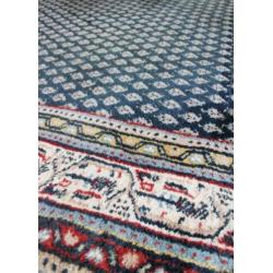 Handgeknoopt blauw Perzisch tapijt. Oosters vintage kleed