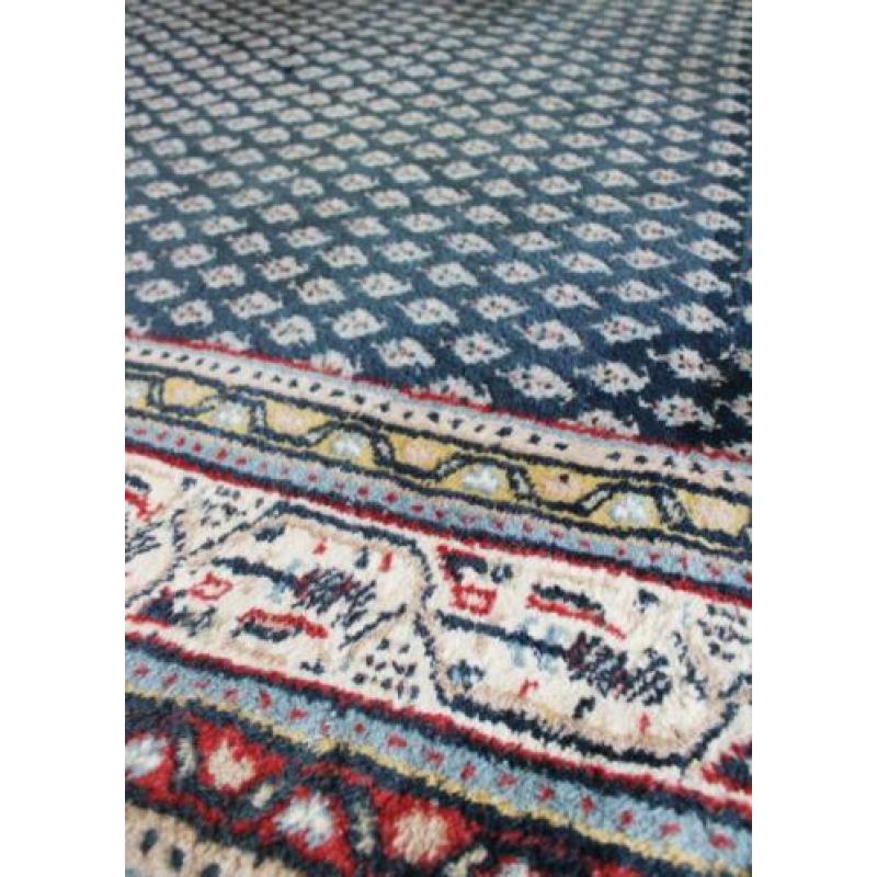 Handgeknoopt blauw Perzisch tapijt. Oosters vintage kleed