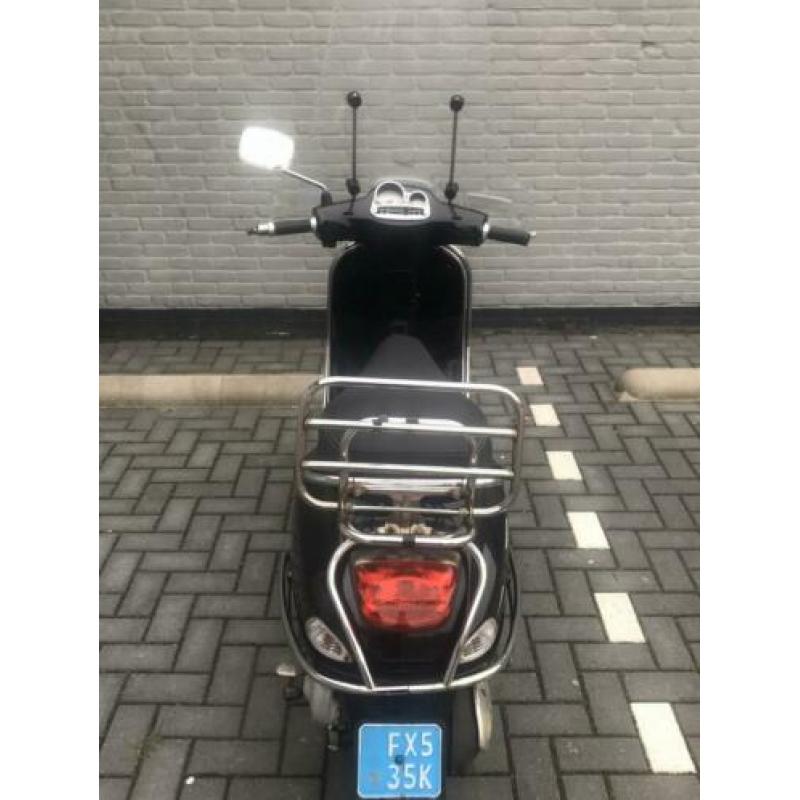 Vespa S blauw kenteken