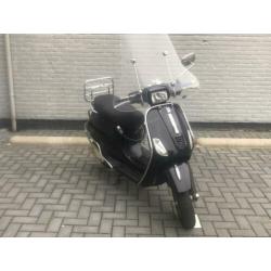 Vespa S blauw kenteken