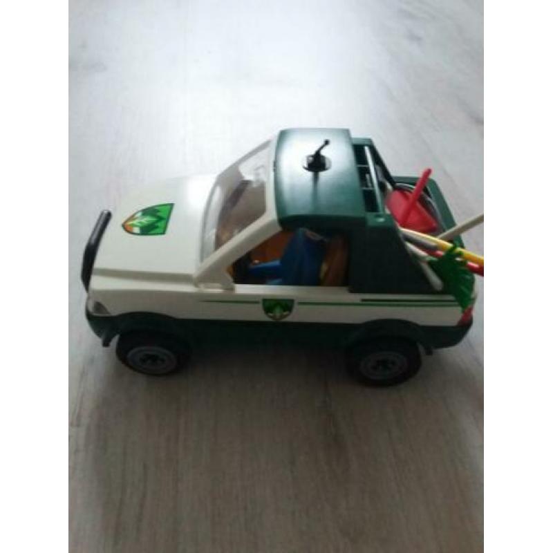 Vintage auto plus aanhanger met boot