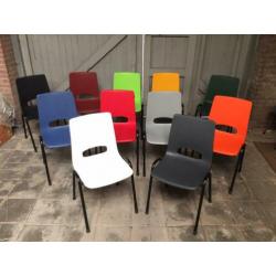 NIEUWE oranje kantinestoelen kuipstoelen stapelstoelen