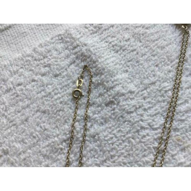 Zilver collier met hanger.