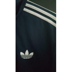 Origineel blauw Adidas jack maat S/M.