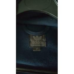 Origineel blauw Adidas jack maat S/M.