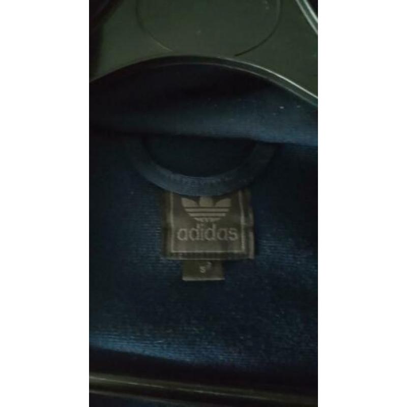 Origineel blauw Adidas jack maat S/M.