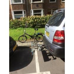 2 vouwfietsen met twinny load fietsendrager