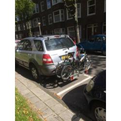 2 vouwfietsen met twinny load fietsendrager
