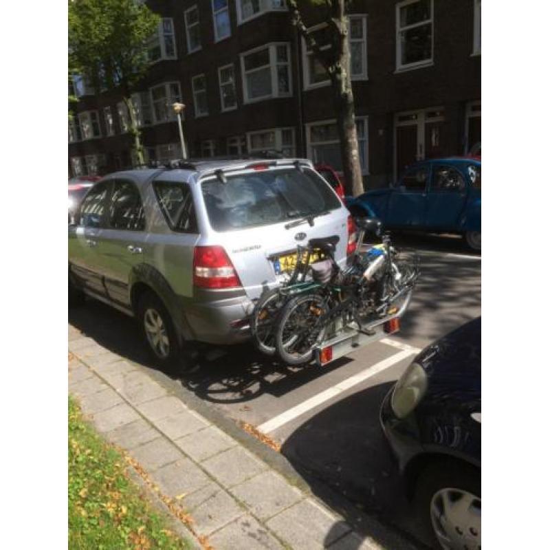 2 vouwfietsen met twinny load fietsendrager
